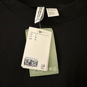 Brand new with tags long sleeve black dress